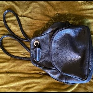 Vintage convertible Tignanello backpack crossbody